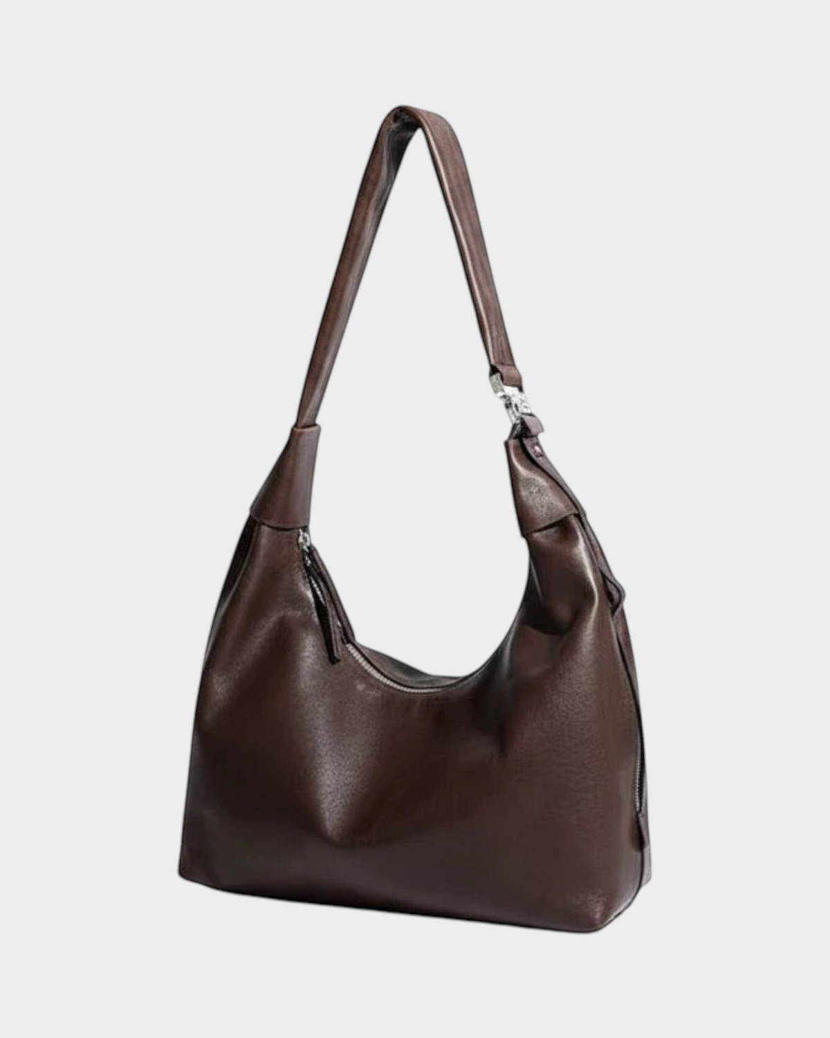 SIEVRA Drift slouchy brown shoulder bag made from a cowhide and leather blend with a zip closure