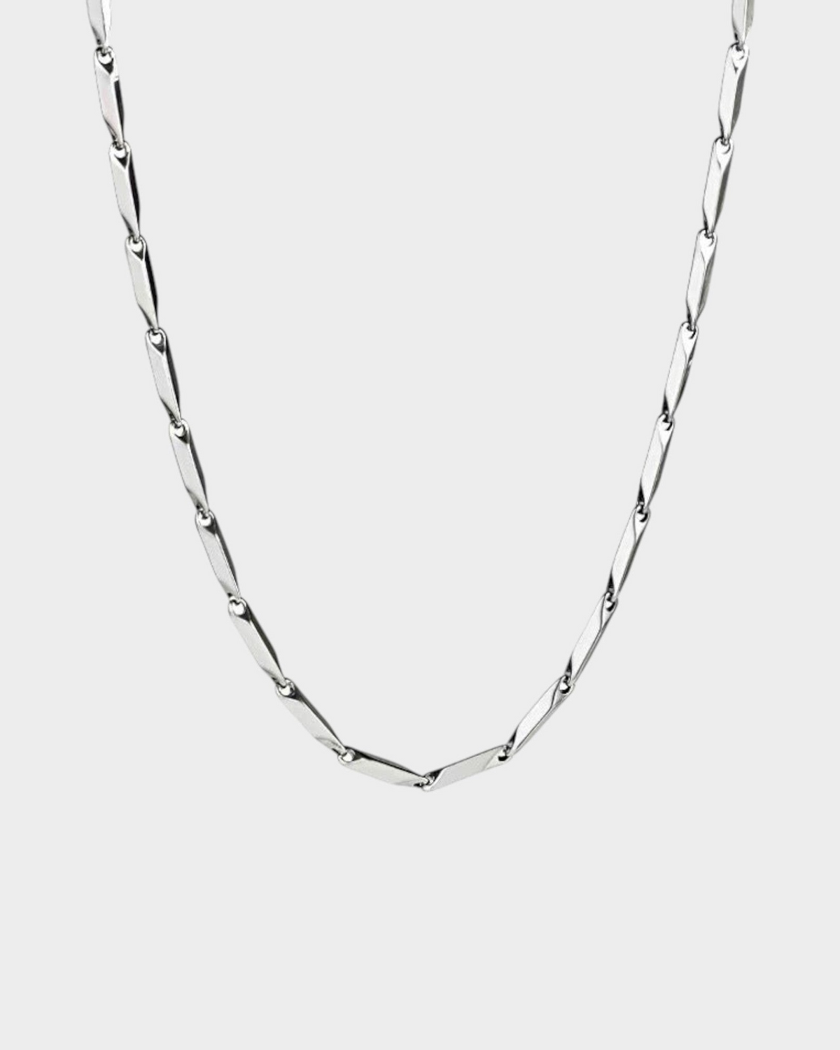 SIEVRA Facet Necklace featuring diamond-cut geometric links in polished silver-tone titanium steel
