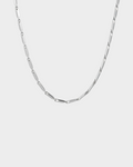 SIEVRA Facet Necklace featuring diamond-cut geometric stainless steel links that catch the light.