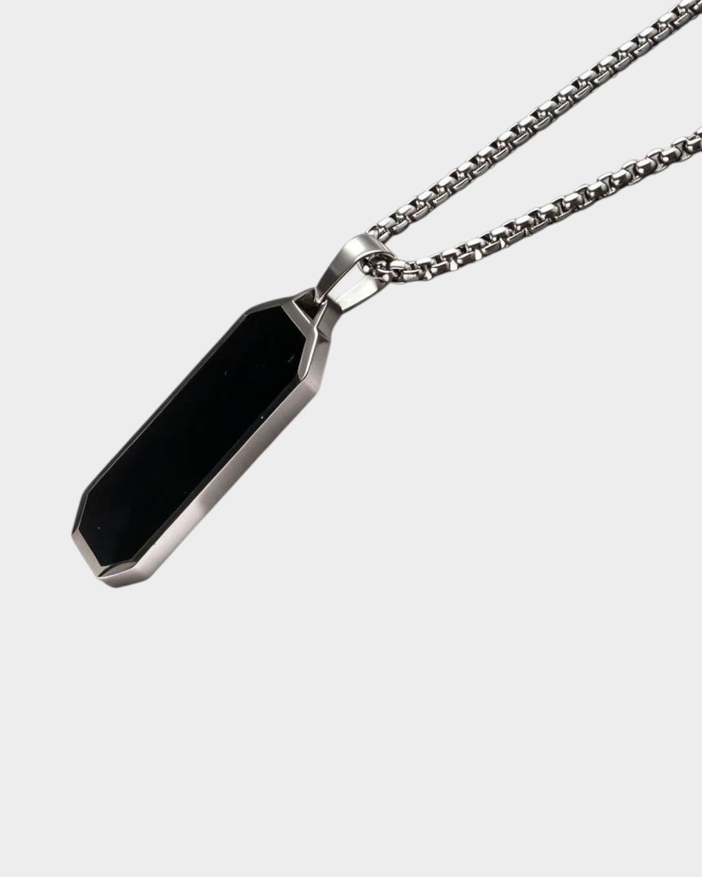 SIEVRA Slate pendant necklace featuring a geometric black inlay on a stainless steel bead chain.