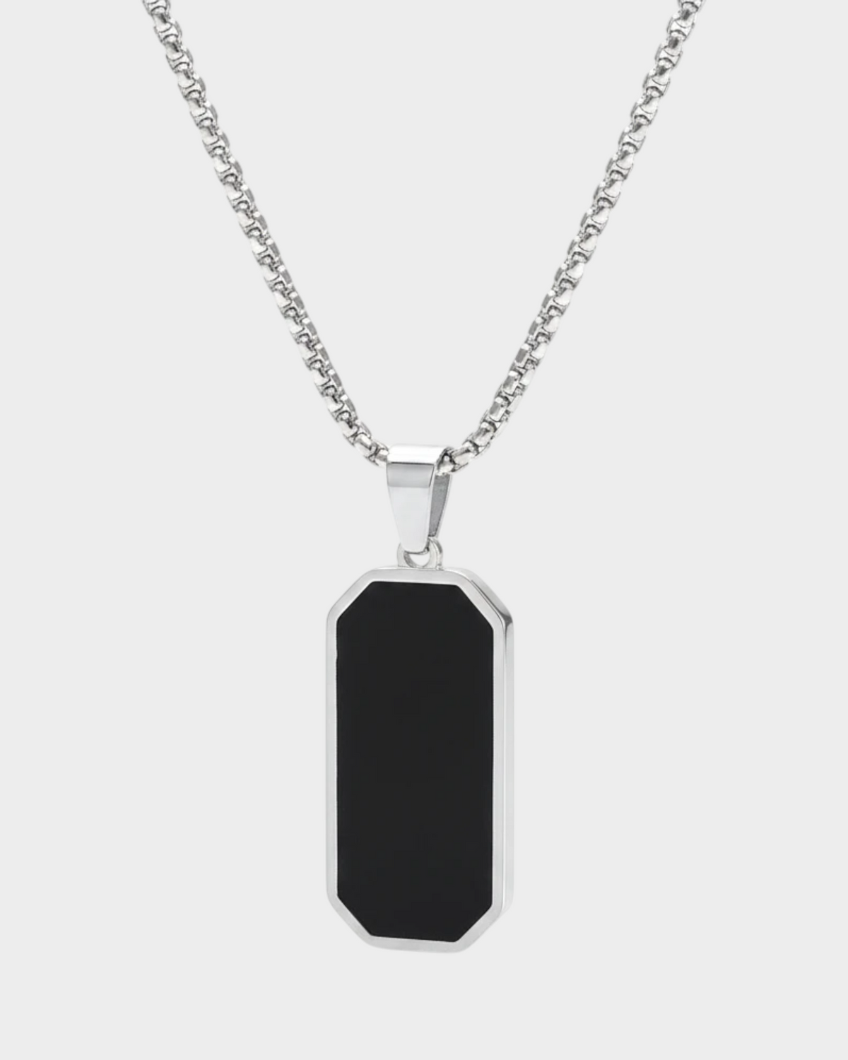 SIEVRA Slate pendant necklace featuring a geometric black inlay pendant on a stainless steel bead chain.
