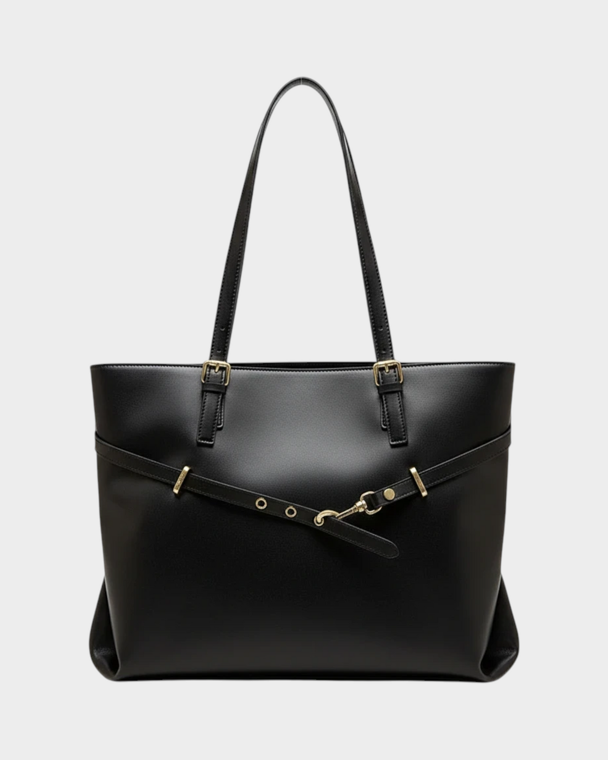 SIEVRA Span black vegan leather tote bag with gold hardware and adjustable strap detail for daily commuting.